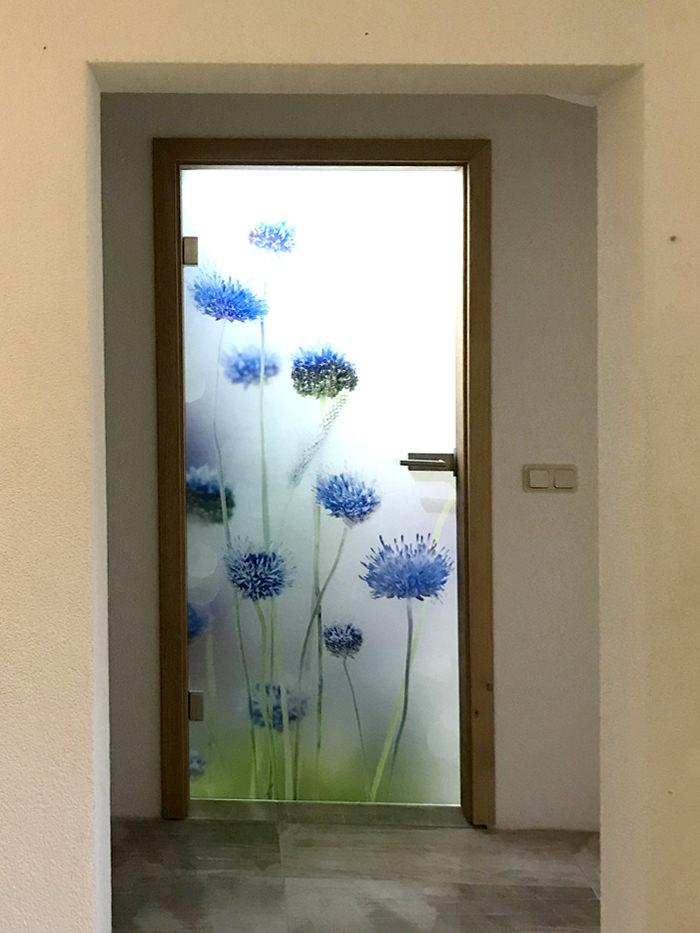 Referenz Glastür Flowers Kunde Grossmann Drehtür